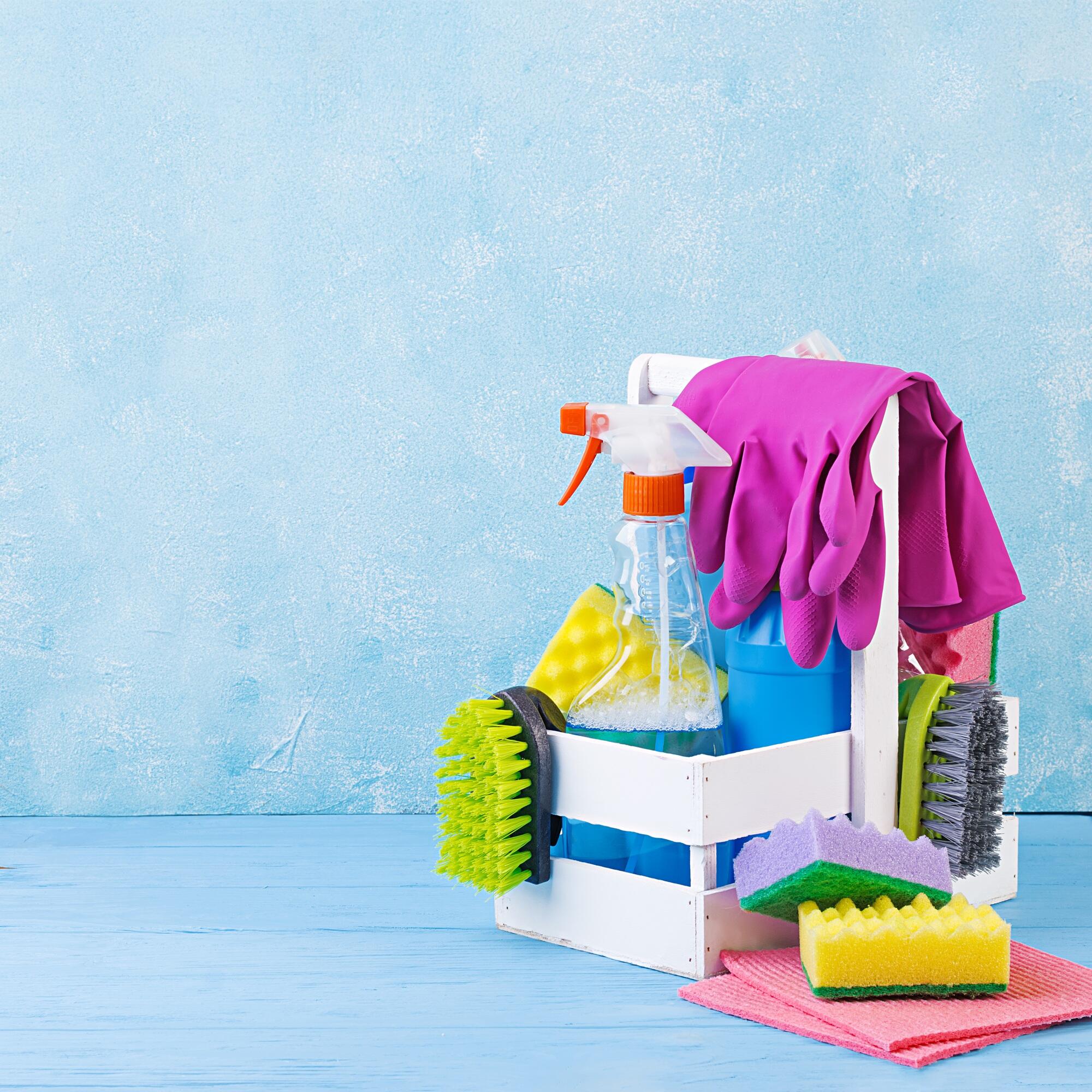 Cleaning service concept. Colorful cleaning set for different surfaces